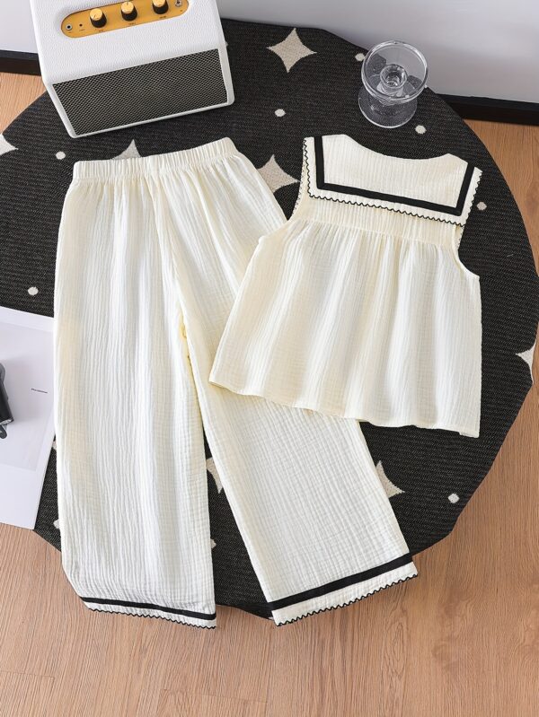 A Stylish New Collection for Girls in Spring And Summer Featuring Elegant And Versatile Designs. The Sleeveless Top Is Made from Quality Fabric with a Large Collar, Adorned with Wood Grain Buttons And Delicate Wave-Edged Ribbon Details. It Pairs Perfectly with Long Pants That Have Matching Wave-Edged Ribbon Accents, Making It a Comfortable Two-Piece Set for Casual Outings And Gatherings. an Exquisite Gift for Friends And Family, for Outdoor - Image 2