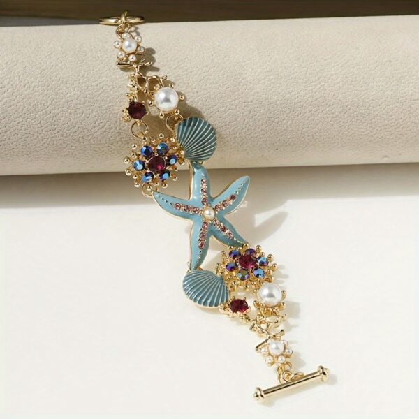 One gorgeous starfish pendant bracelet with shell details and sea coral beads suitable for beach daily wear and ocean vacation style - Image 7