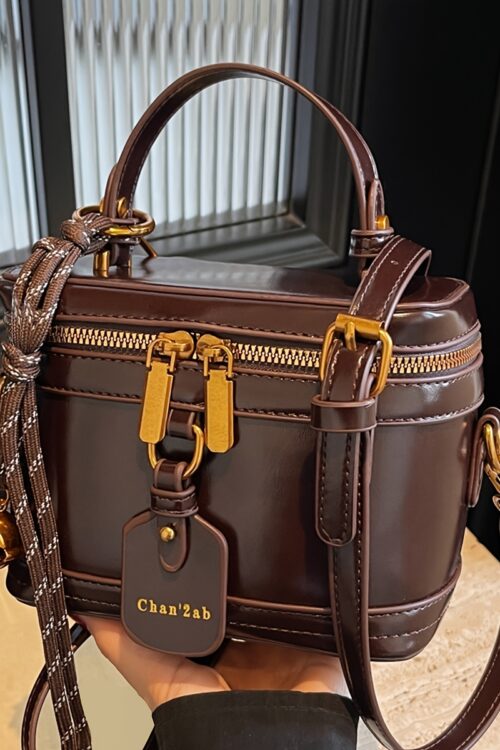 Elegant Retro Women’s Crossbody Bag with Bell Pendant – Stylish Brown Handbag with Adjustable Strap, Zipper Closure, and Golden-Tone Hardware for Work, Date, Shop, and Party