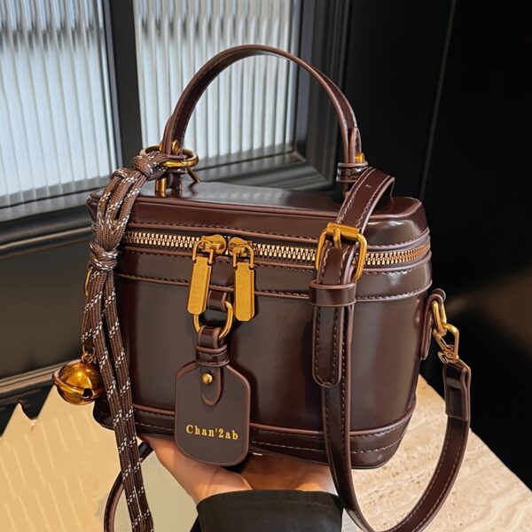 Elegant Retro Women's Crossbody Bag with Bell Pendant – Stylish Brown Handbag with Adjustable Strap, Zipper Closure, and Golden-Tone Hardware for Work, Date, Shop, and Party