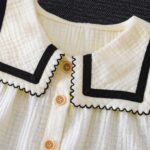 A Stylish New Collection for Girls in Spring And Summer Featuring Elegant And Versatile Designs. The Sleeveless Top Is Made from Quality Fabric with a Large Collar, Adorned with Wood Grain Buttons And Delicate Wave-Edged Ribbon Details. It Pairs Perfectly with Long Pants That Have Matching Wave-Edged Ribbon Accents, Making It a Comfortable Two-Piece Set for Casual Outings And Gatherings. an Exquisite Gift for Friends And Family, for Outdoor - Image 7