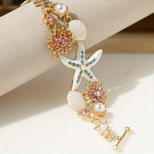 One gorgeous starfish pendant bracelet with shell details and sea coral beads suitable for beach daily wear and ocean vacation style - Image 8