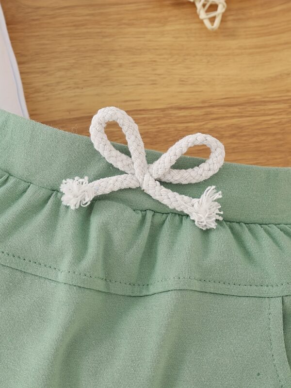 Two-Piece Set for Baby Boys Featuring a Short-Sleeve T-Shirt with a Front Pocket And Solid Color Shorts, for Outdoor - Image 9