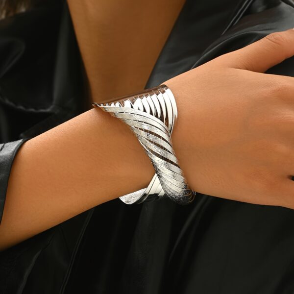 A Bold Twisted Line Design With A Matte Finish, This European And American Style Bangle Is Suitable For Daily Wear By Women. - Image 4