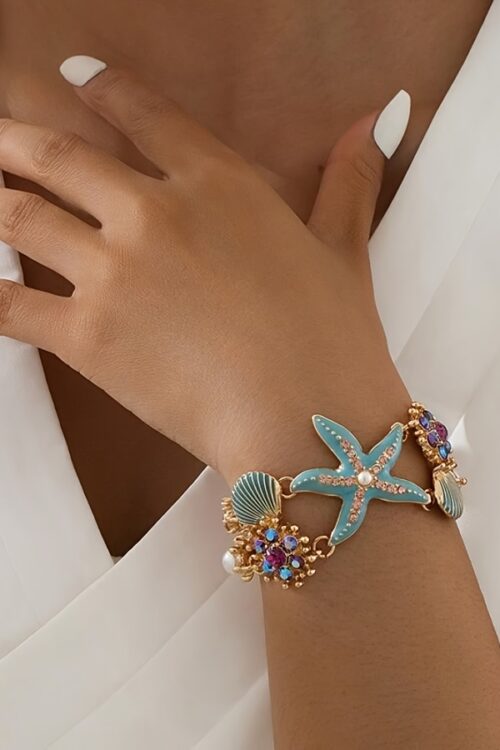 One gorgeous starfish pendant bracelet with shell details and sea coral beads suitable for beach daily wear and ocean vacation style