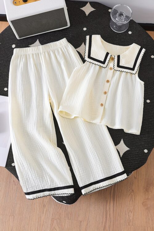 A Stylish New Collection for Girls in Spring And Summer Featuring Elegant And Versatile Designs. The Sleeveless Top Is Made from Quality Fabric with a Large Collar, Adorned with Wood Grain Buttons And Delicate Wave-Edged Ribbon Details. It Pairs Perfectly with Long Pants That Have Matching Wave-Edged Ribbon Accents, Making It a Comfortable Two-Piece Set for Casual Outings And Gatherings. an Exquisite Gift for Friends And Family, for Outdoor