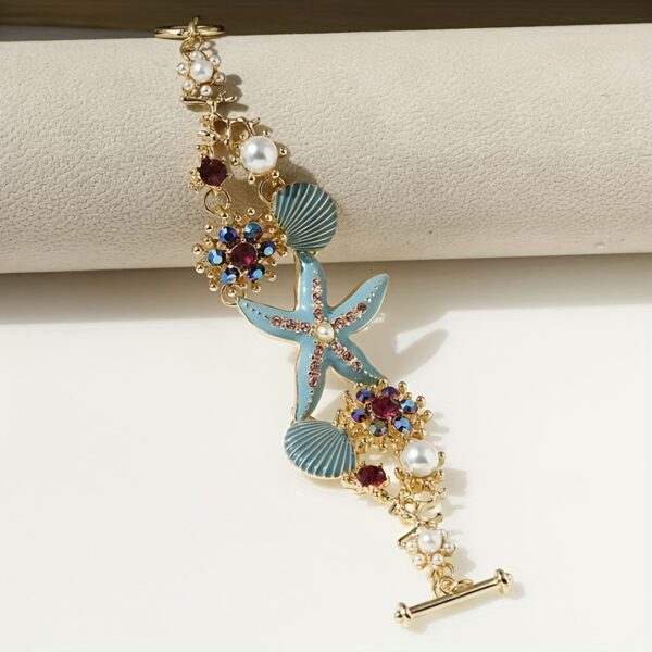 One gorgeous starfish pendant bracelet with shell details and sea coral beads suitable for beach daily wear and ocean vacation style - Image 5