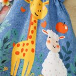 A Cute Sleeveless Dress for Baby Girls Featuring a Shirt Collar, Print Faux Denim, And Animal-Themed Designs, Perfect for Summer. - Image 6