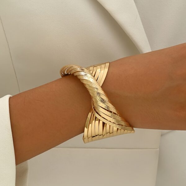 A Bold Twisted Line Design With A Matte Finish, This European And American Style Bangle Is Suitable For Daily Wear By Women. - Image 3