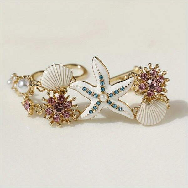 One gorgeous starfish pendant bracelet with shell details and sea coral beads suitable for beach daily wear and ocean vacation style - Image 2